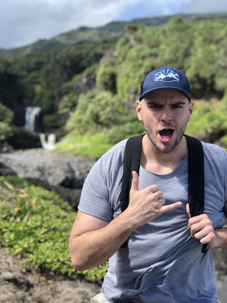 Rob hiking, mid-shout at the trail
